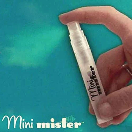 Hand holding a Ranger Mini Mister custom spray water spritzer against a blue background