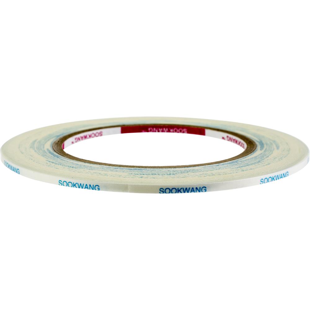 Roll of Scor-Tape 1/8 inch wide double-sided adhesive tape.