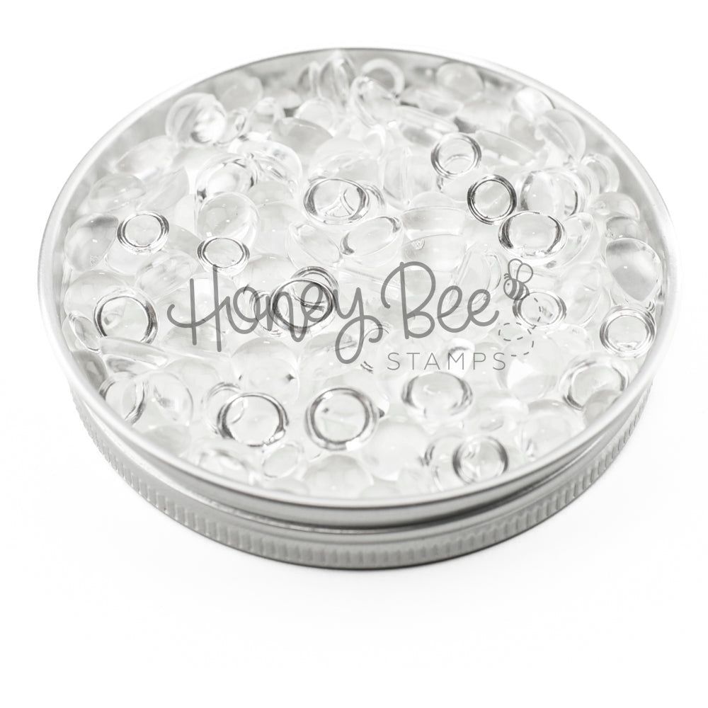 Clear Dew Drops by Honey Bee Stamps in a silver metal tin.