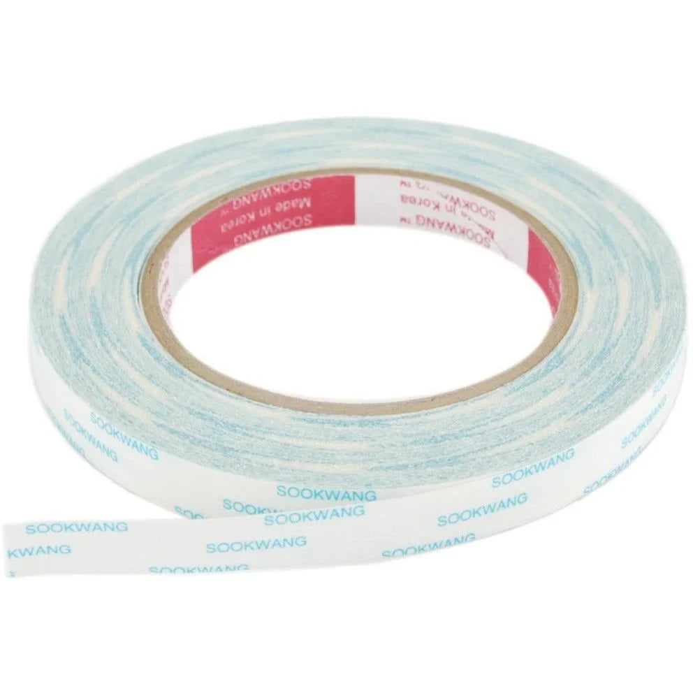 Roll of Scor-Tape 1/2 inch wide double-sided adhesive tape.