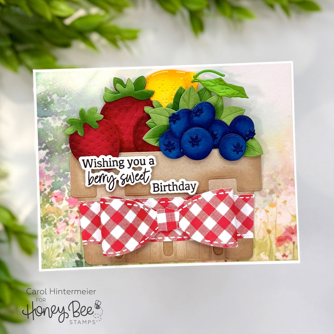 Handmade birthday card featuring a 3D berry basket with strawberries, blueberries, and a red bow.