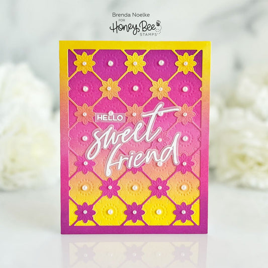Handmade card with a purple and yellow gradient, floral die-cuts, and 'Hello Sweet Friend' text.