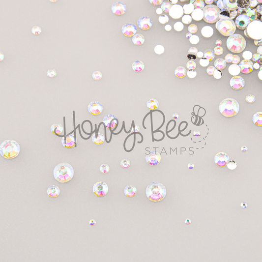 Rainbow flatback crystal gems rhinestone mix by Honey Bee Stamps on a light grey background.