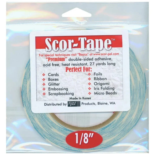 Scor-Tape 1/8 inch wide double-sided adhesive tape roll for scrapbooking and card making.